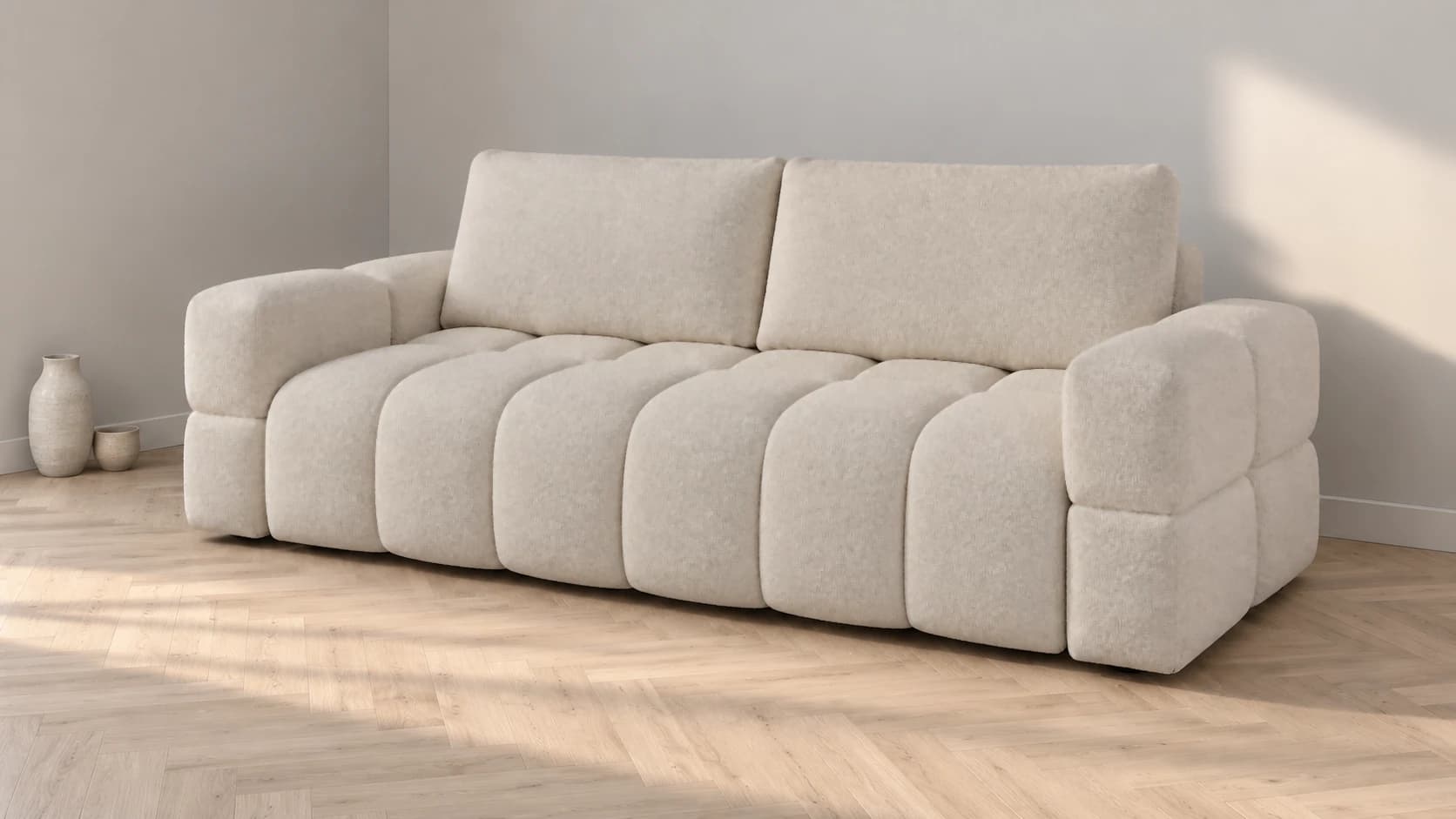 Sofa ISSORO z bokami z dwóch wałków w prostym wnętrzu